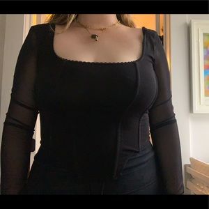 Black corset top with mesh sleeves